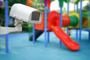 school playground with security camera